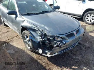 2004 Pontiac Grand Am SE1 with VIN 1G2NF52E04M653375, listed as a IAAI auction lot 41787184 with 100,062 mi miles. Bid and sale history available at carsss.com. Image 6.