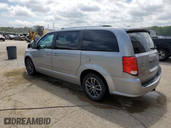 2016 Dodge Grand Caravan SXT with VIN 2C4RDGCG1GR369947, listed as a Copart auction lot 54504805 with 135,179 mi miles and Salvage Title. Bid and sale history available at DreamBid. Image 2.