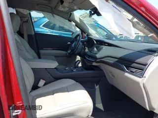 2019 Cadillac XT4 FWD Premium Luxury with VIN 1GYFZCR49KF207634, listed as a IAAI auction lot 42256021 with 67,481 mi miles and . Bid and sale history available at DreamBid. Image 5.