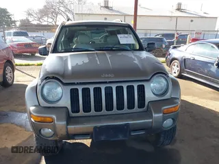 2004 Jeep Liberty Limited with VIN 1J4GL58K64W254155, listed as a IAAI auction lot 41350175 with 165,822 mi miles. Bid and sale history available at carsss.com. Image 12.