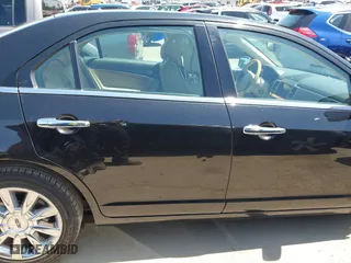 2011 Lincoln MKZ with VIN 3LNHL2GC2BR769295, listed as a IAAI auction lot 41977083 with 103,037 mi miles. Bid and sale history available at carsss.com. Image 14.