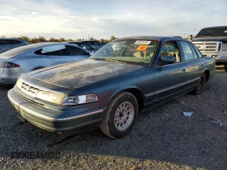 1996 Ford Crown Victoria LX с VIN 2FALP74W0TX129092, выставлен на аукционе Copart как лот 80364334 с пробегом 135 563 миль миль и Чистый • Clean title. История ставок и продаж доступна на DreamBid. Изображение 1.