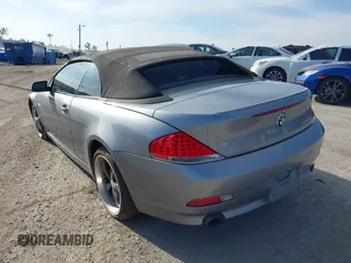 2007 BMW 6 Series 650i with VIN WBAEK13547CN82672, listed as a IAAI auction lot 40927402 with 183,197 mi miles. Bid and sale history available at carsss.com. Image 3.