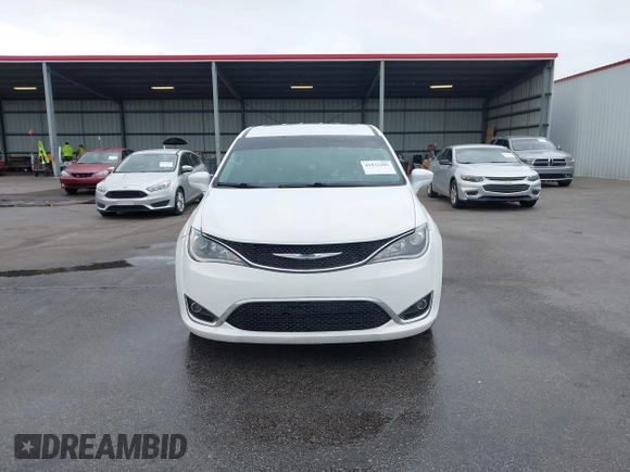 2020 Chrysler Pacifica Touring with VIN 2C4RC1FG4LR135808, listed as a IAAI auction lot 41932205 with 152,073 mi miles and . Bid and sale history available at DreamBid. Image 12.