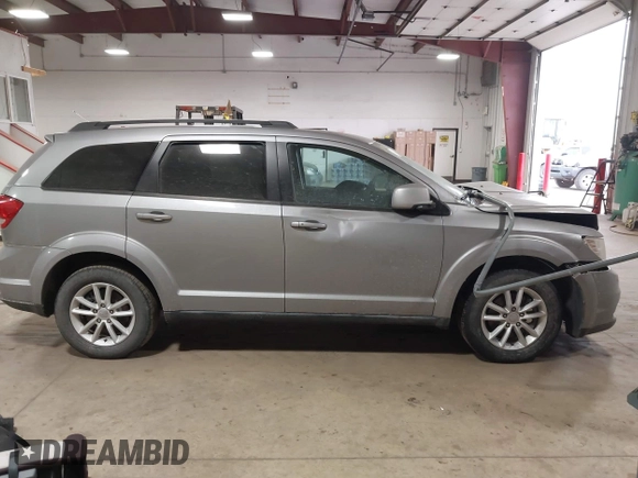 2016 Dodge Journey SXT with VIN 3C4PDCBG0GT198686, listed as a IAAI auction lot 41561007 with 85,289 mi miles. Bid and sale history available at carsss.com. Image 12.