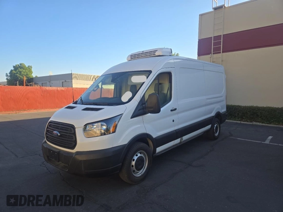 2019 Ford Transit with VIN 1FTYR2CM0KKA98621, listed as a Copart auction lot 60940125 with 77,075 mi miles and Salvage title. Bid and sale history available at DreamBid. Image 2.