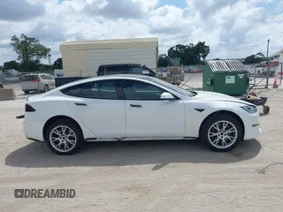 2022 Tesla Model S Plaid with VIN 5YJSA1E6XNF473888, listed as a IAAI auction lot 42141141 with 28,584 mi miles and . Bid and sale history available at carsss.com. Image 13.