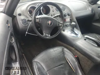 2008 Pontiac Solstice z VIN 1G2MB35B78Y104316, wystawiony jako Copart lot #58829185 z przebiegiem 194 147 mil mil oraz Tytuł czysty. Historia ofert i sprzedaży dostępna na DreamBid. Obrazek 8.