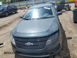 2012 Ford Fusion SEL z VIN 3FAHP0JG7CR297174, wystawiony jako Copart lot #55469005 z przebiegiem 129 434 mil mil oraz Szkoda całkowita • Salvage title. Historia ofert i sprzedaży dostępna na DreamBid. Obrazek 5.