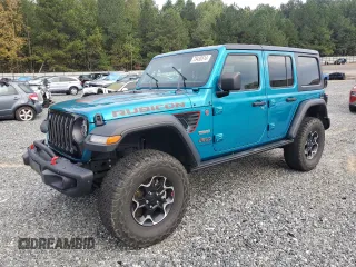 2020 Jeep Wrangler Unlimited Recon with VIN 1C4HJXFN5LW330617, listed as a Copart auction lot 73430514 with 52,827 mi miles and Salvage title. Bid and sale history available at DreamBid. Image 1.