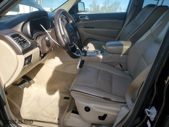 2014 Jeep Grand Cherokee Overland with VIN 1C4RJFCG8EC437489, listed as a Copart auction lot 41781595 with 174,862 mi miles and Salvage Title. Bid and sale history available at carsss.com. Image 7.