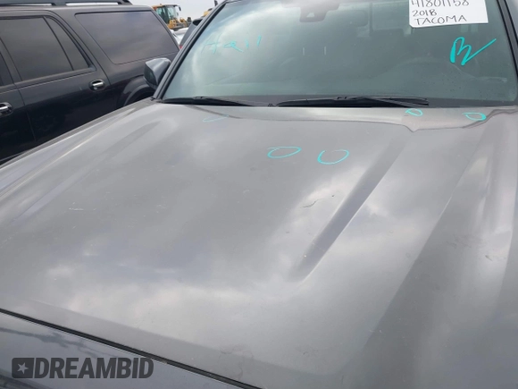 2018 Toyota Tacoma SR with VIN 5TFCZ5AN6JX127774, listed as a IAAI auction lot 41801158 with 28,161 mi miles and . Bid and sale history available at DreamBid. Image 6.