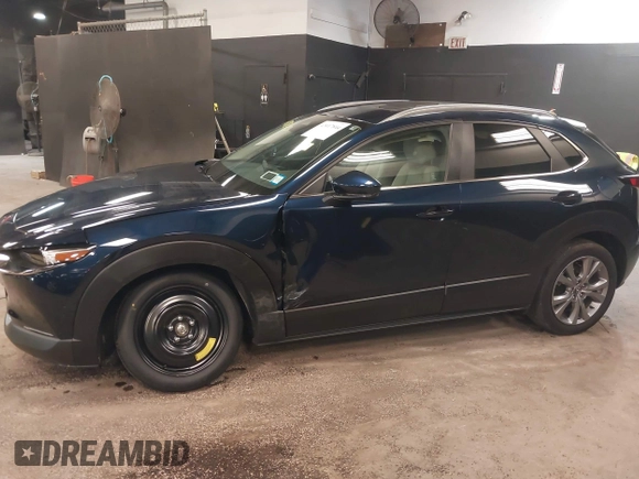 2024 Mazda CX-30 S Preferred z VIN 3MVDMBCM9RM700673, wystawiony jako IAAI lot #42417844 z przebiegiem 7 385 mil mil oraz . Historia ofert i sprzedaży dostępna na DreamBid. Obrazek 6.