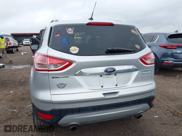2015 Ford Escape Titanium with VIN 1FMCU0JX7FUB60418, listed as a IAAI auction lot 42485107 with 82,172 mi miles and . Bid and sale history available at DreamBid. Image 16.