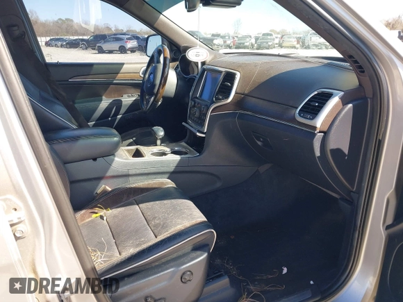 2014 Jeep Grand Cherokee Overland with VIN 1C4RJECG9EC206787, listed as a IAAI auction lot 41730875 with 194,196 mi miles. Bid and sale history available at carsss.com. Image 5.