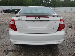 2012 Ford Fusion SE z VIN 3FAHP0HA4CR185059, wystawiony jako Copart lot #56875985 z przebiegiem 173 644 mil mil oraz Nie do naprawy. Historia ofert i sprzedaży dostępna na DreamBid. Obrazek 6.
