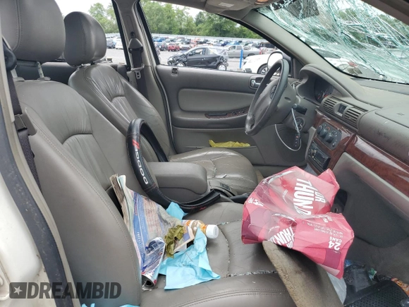 2002 Chrysler Sebring Touring with VIN 1C3EL56R42N346028, listed as a Copart auction lot 65267564 with 97,219 mi miles and Salvage title. Bid and sale history available at DreamBid. Image 7.