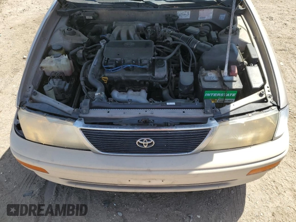1997 Toyota Avalon XL with VIN 4T1BF12B0VU187179, listed as a Copart auction lot 54708565 with 336,922 mi miles and Salvage Title. Bid and sale history available at DreamBid. Image 11.