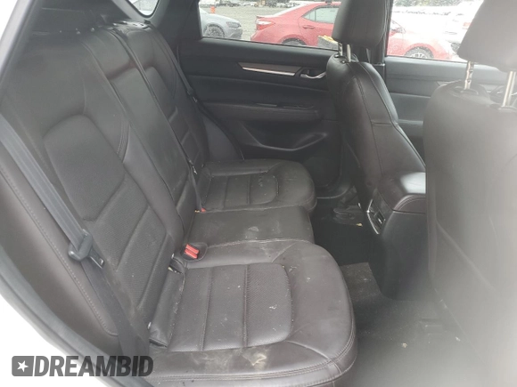 2021 Mazda CX-5 Signature with VIN JM3KFBEY3M0410998, listed as a Copart auction lot 54868885 with 73,207 mi miles and Salvage Title. Bid and sale history available at carsss.com. Image 11.