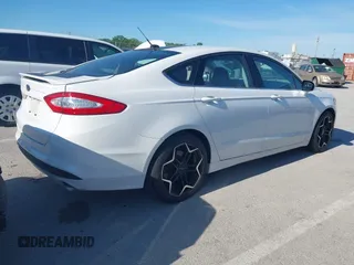 2015 Ford Fusion SE with VIN 3FA6P0H75FR294386, listed as a IAAI auction lot 42332348 with 130,984 mi miles and . Bid and sale history available at DreamBid. Image 4.