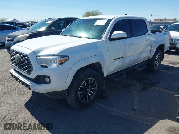 2021 Toyota Tacoma SR with VIN 3TYAX5GN5MT014868, listed as a IAAI auction lot 41549927 with 30,653 mi miles and . Bid and sale history available at DreamBid. Image 18.