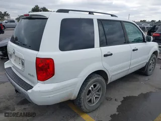 2004 Honda Pilot EX with VIN 2HKYF18464H503605, listed as a IAAI auction lot 41373673 with 112,919 mi miles. Bid and sale history available at carsss.com. Image 4.