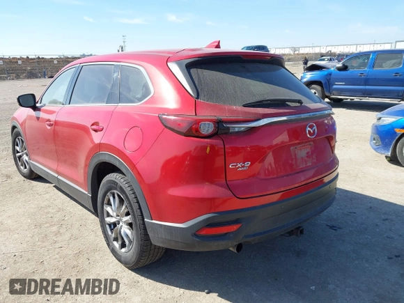 2016 Mazda CX-9 Touring z VIN JM3TCBCY7G0100311, wystawiony jako IAAI lot #41588448 z przebiegiem 115 364 mil mil oraz . Historia ofert i sprzedaży dostępna na DreamBid. Obrazek 3.