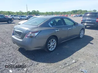 2014 Nissan Maxima S with VIN 1N4AA5AP9EC458206, listed as a IAAI auction lot 42164044 with 109,194 mi miles and . Bid and sale history available at DreamBid. Image 4.