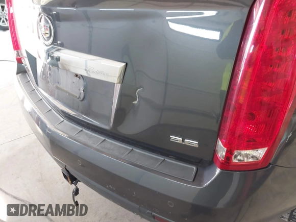 2012 Cadillac SRX Luxury Collection with VIN 3GYFNDE38CS654886, listed as a IAAI auction lot 41758399 with 210,680 mi miles. Bid and sale history available at carsss.com. Image 6.