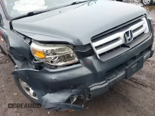 2006 Honda Pilot EX with VIN 5FNYF18496B021499, listed as a IAAI auction lot 41540784 with 232,665 mi miles and . Bid and sale history available at DreamBid. Image 6.