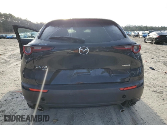 2021 Mazda CX-30 Select with VIN 3MVDMBBL1MM253743, listed as a Copart auction lot 48373625 with 59,466 mi miles and Salvage Title. Bid and sale history available at carsss.com. Image 6.