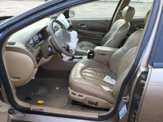 1999 Chrysler 300M M z VIN 2C3HE66G3XH577241, wystawiony jako Copart lot #39567584 z przebiegiem Nie podano mil oraz Nie do naprawy • Non repairable. Historia ofert i sprzedaży dostępna na DreamBid. Obrazek 7.