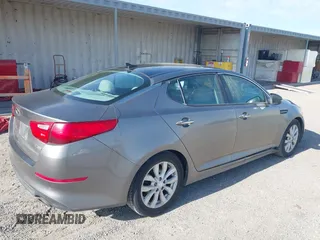 2014 Kia Optima EX with VIN 5XXGN4A7XEG346890, listed as a IAAI auction lot 42174866 with 179,450 mi miles and . Bid and sale history available at carsss.com. Image 4.