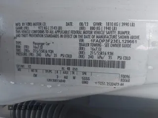 2014 Ford Focus SE with VIN 1FADP3F23EL129661, listed as a IAAI auction lot 41676155 with 183,733 mi miles. Bid and sale history available at carsss.com. Image 9.