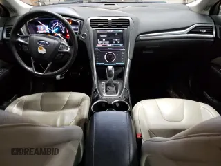 2014 Ford Fusion Titanium Hybrid with VIN 3FA6P0RU6ER219036, listed as a Copart auction lot 57476985 with 189,113 mi miles and Clean title. Bid and sale history available at DreamBid. Image 8.
