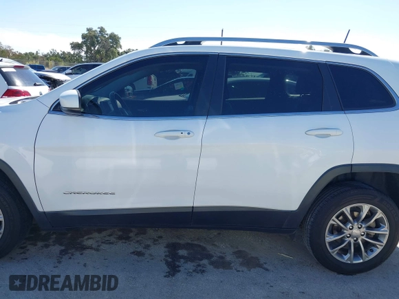 2019 Jeep Cherokee Latitude Plus with VIN 1C4PJLLNXKD290098, listed as a IAAI auction lot 40840063 with 202,244 mi miles and . Bid and sale history available at DreamBid. Image 14.