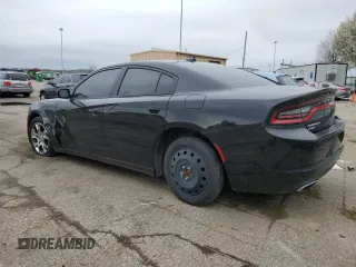 2015 Dodge Charger SXT with VIN 2C3CDXJG3FH919988, listed as a Copart auction lot 49340374 with 99,200 mi miles and Salvage title. Bid and sale history available at DreamBid. Image 2.