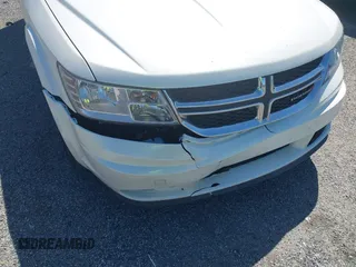 2014 Dodge Journey SE with VIN 3C4PDCAB9ET121415, listed as a IAAI auction lot 42138601 with 157,043 mi miles. Bid and sale history available at carsss.com. Image 6.