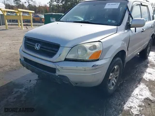2004 Honda Pilot EX with VIN 2HKYF18634H515163, listed as a IAAI auction lot 40786017 with 206,036 mi miles. Bid and sale history available at carsss.com. Image 6.