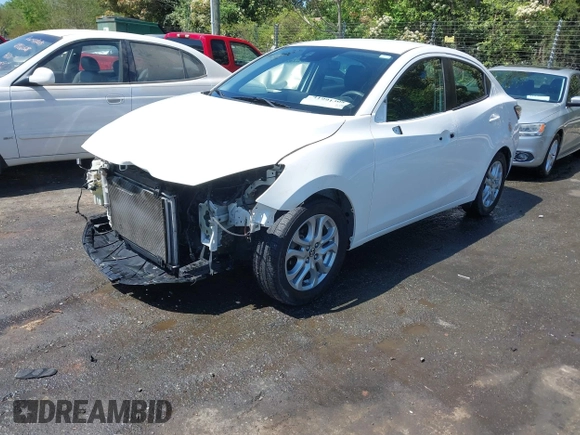 2016 Scion iA z VIN 3MYDLBZVXGY122157, wystawiony jako IAAI lot #41991308 z przebiegiem 133 026 mil mil oraz . Historia ofert i sprzedaży dostępna na DreamBid. Obrazek 18.
