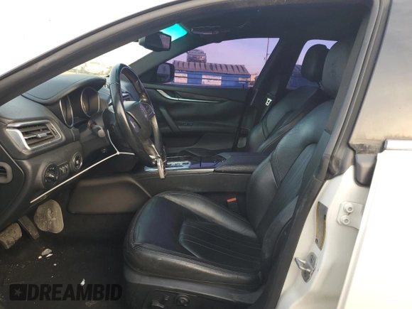 2014 Maserati Ghibli z VIN ZAM57XSA6E1097525, wystawiony jako Copart lot #42029695 z przebiegiem 93 740 mil mil oraz Szkoda całkowita • Salvage title. Historia ofert i sprzedaży dostępna na DreamBid. Obrazek 7.