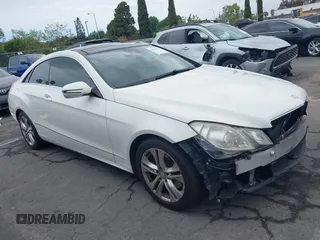 2010 Mercedes-Benz E with VIN WDDKJ5GB0AF005357, listed as a IAAI auction lot 42020474 with 133,117 mi miles. Bid and sale history available at carsss.com. Image 14.
