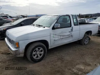 1997 Nissan Frontier XE with VIN 1N6SD16S4VC380295, listed as a Copart auction lot 45569725 with 128,660 mi miles and Salvage title. Bid and sale history available at DreamBid. Image 1.