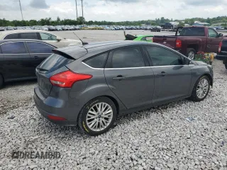 2017 Ford Focus Titanium z VIN 1FADP3N22HL307260, wystawiony jako Copart lot #61399785 z przebiegiem 103 293 mil mil oraz Szkoda całkowita • Salvage title. Historia ofert i sprzedaży dostępna na DreamBid. Obrazek 3.