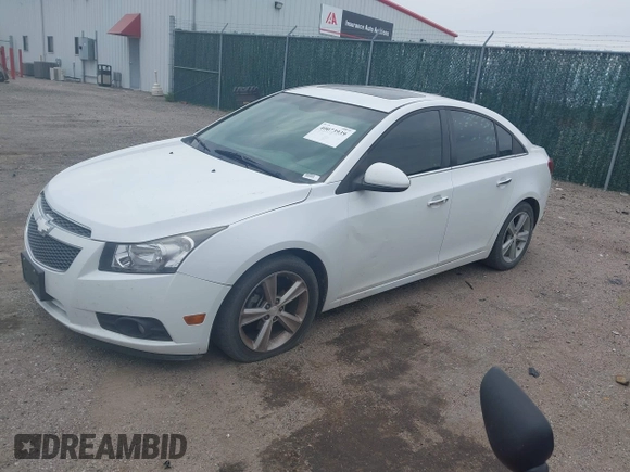 2012 Chevrolet Cruze 2LT with VIN 1G1PG5SC8C7253389, listed as a IAAI auction lot 40073939 with 163,742 mi miles and . Bid and sale history available at DreamBid. Image 2.