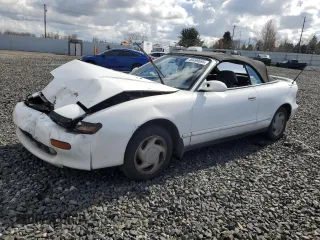1991 Toyota Celica z VIN JT5ST87K7M0081649, wystawiony jako Copart lot #49499685 z przebiegiem 187 356 mil mil oraz Szkody całkowita. Historia ofert i sprzedaży dostępna na DreamBid. Obrazek 1.