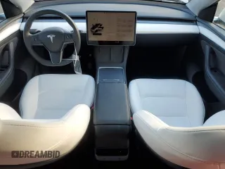 2023 Tesla Model Y Long Range with VIN 7SAYGAEE1PF967353, listed as a Copart auction lot 88700135 with 16,249 mi miles and Salvage Title. Bid and sale history available at DreamBid. Image 8.