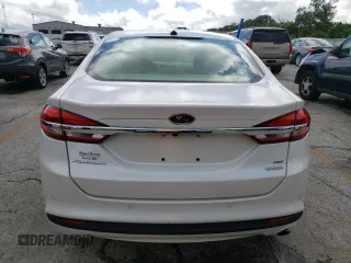 2018 Ford Fusion SE z VIN 3FA6P0HD9JR183760, wystawiony jako Copart lot #59983025 z przebiegiem 95 206 mil mil oraz Szkoda całkowita • Salvage title. Historia ofert i sprzedaży dostępna na DreamBid. Obrazek 6.
