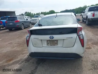 2016 Toyota Prius Two with VIN JTDKBRFU3G3523524, listed as a IAAI auction lot 42077253 with 293,150 mi miles. Bid and sale history available at carsss.com. Image 17.