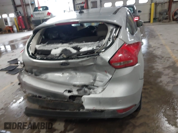 2018 Ford Focus Titanium with VIN 1FADP3N25JL261736, listed as a IAAI auction lot 41032128 with 59,142 mi miles and . Bid and sale history available at DreamBid. Image 16.